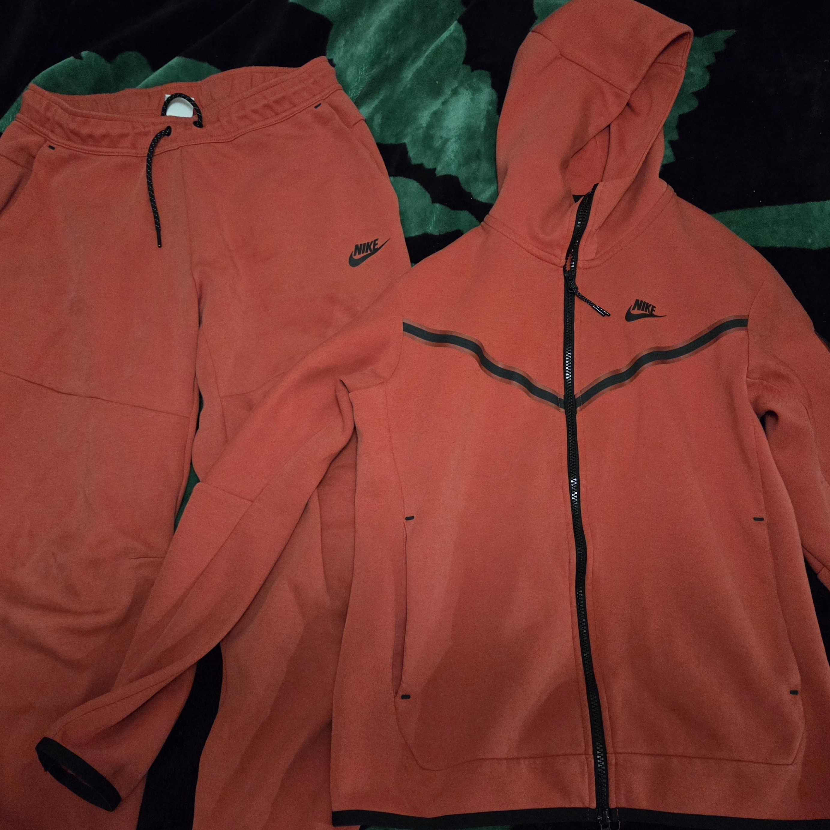 Nike Red Garment With Black Logo Tag